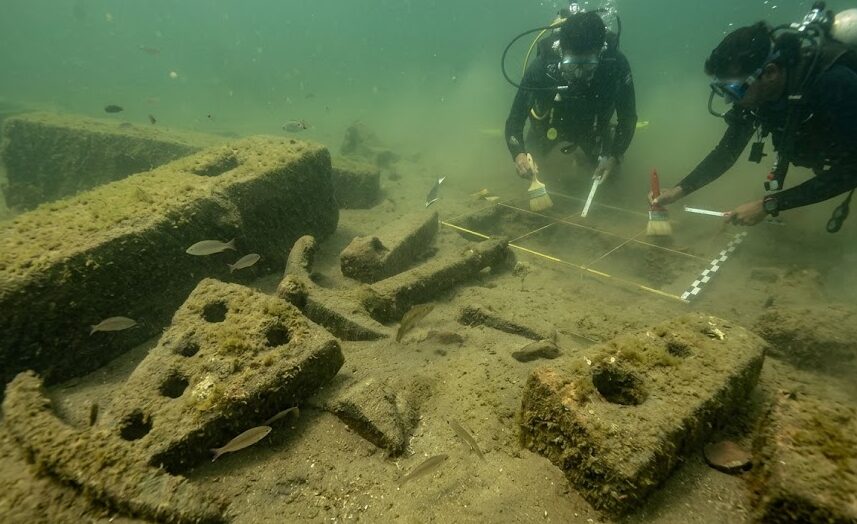 Underwater Cities Ancient underwater ruins of Dwarka in India, featuring massive stone blocks on the seafloor.